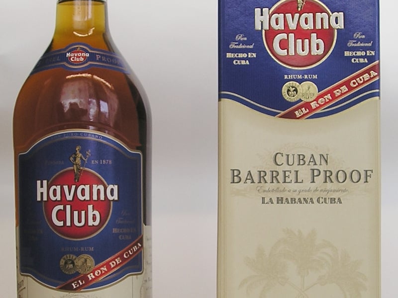 Dark aged Caribbean rum bottle with warm amber tones